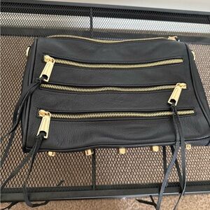 Black Leather Crossbody Bag with Gold Accents